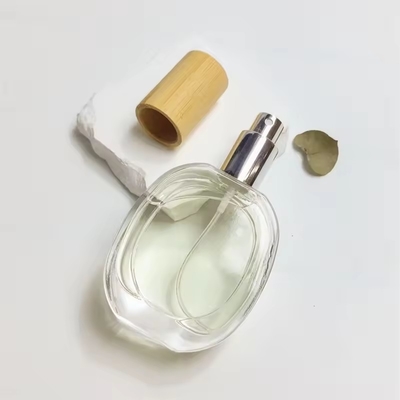 Bottiglia di vetro per profumi Bottiglia rotonda trasparente bottiglia portatile spray