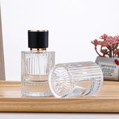 Bottiglia di vetro per profumi di cilindro vuoto e chiaro Bottiglia spray atomizzatore