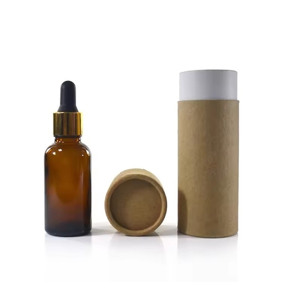 Bottiglia di olio essenziale di vetro vuoto con tappo a goccia con imballaggio Kraft riciclato
